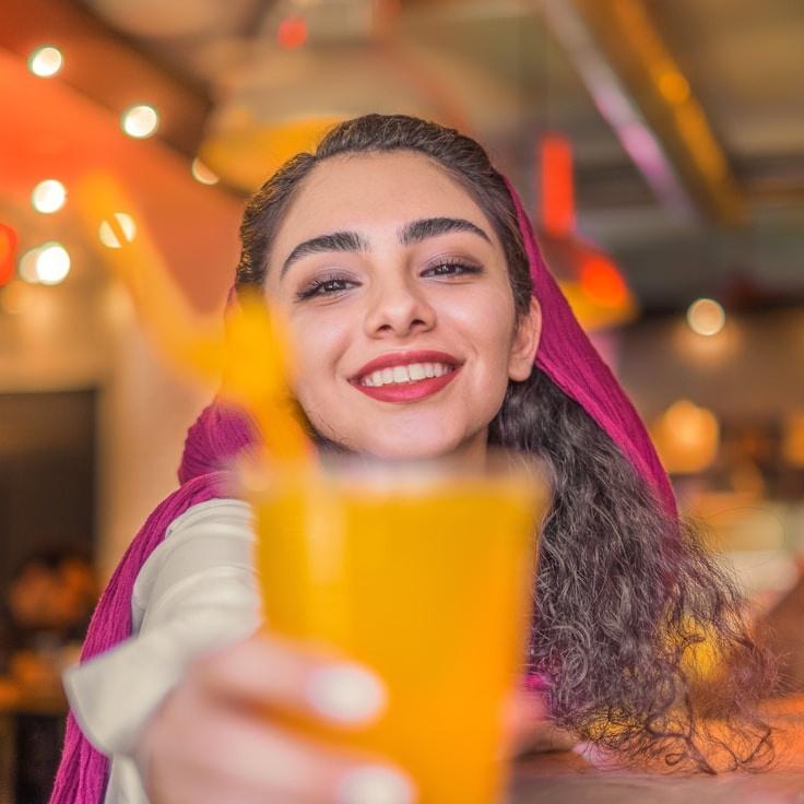 Riya Kapoor, Client Relations Director, discussing corporate gifting strategy with business clients